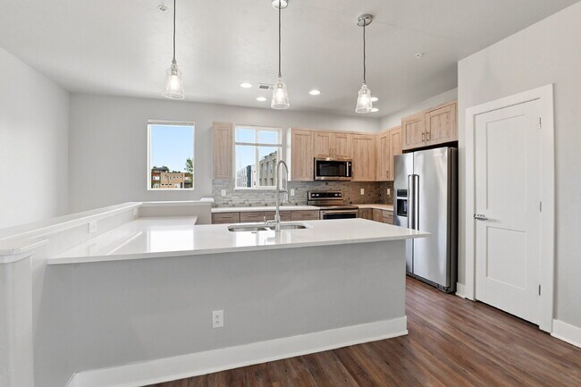 Building Photo - $2,890.95, 2-bed, 2.5-bath, located in Denver with a rooftop terrace.