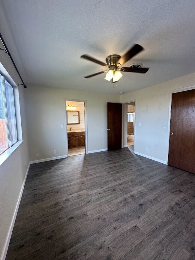 Building Photo - New exterior paint!  LVP flooring! Large y...