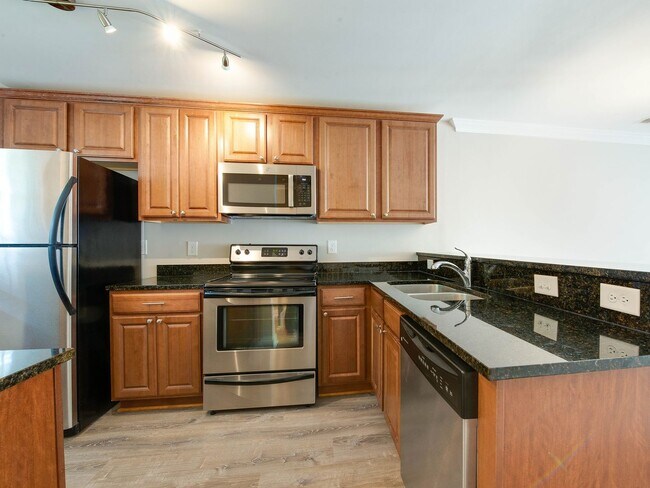 Building Photo - Stunning and completely updated townhome s...
