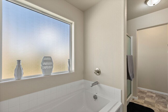 Building Photo - Spacious 4-Bedroom Home with Private Backy...