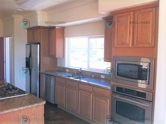 Building Photo - Stunning 3-Bedroom Townhome with Panoramic City Views, Upgraded Kitchen & Spacious Living in Nort...