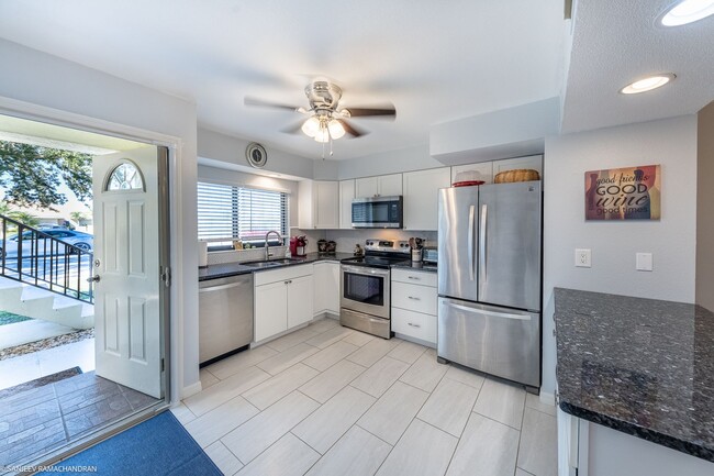 Building Photo - TURNKEY FURNISHED RENTAL ON GOLF COURSE. GROUND FLOOR UNIT