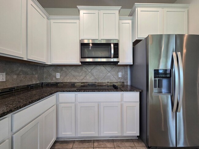 Building Photo - PRICE REDUCTION - AVAILABLE NOW!