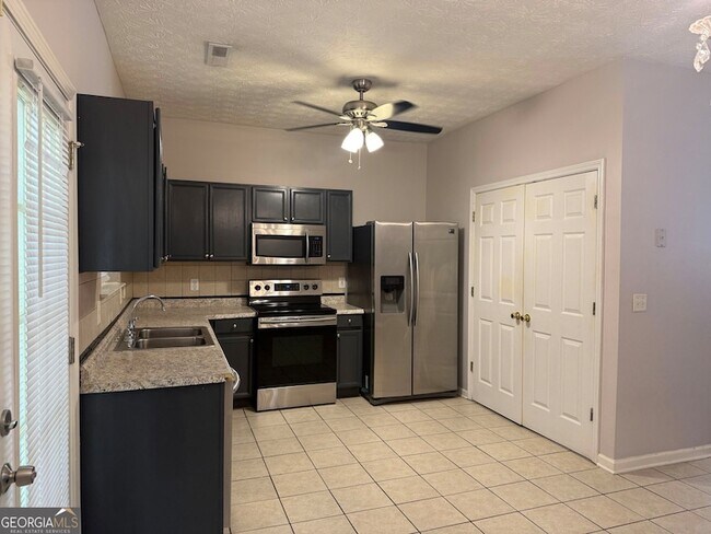Building Photo - 1704 Camden Forrest Tr