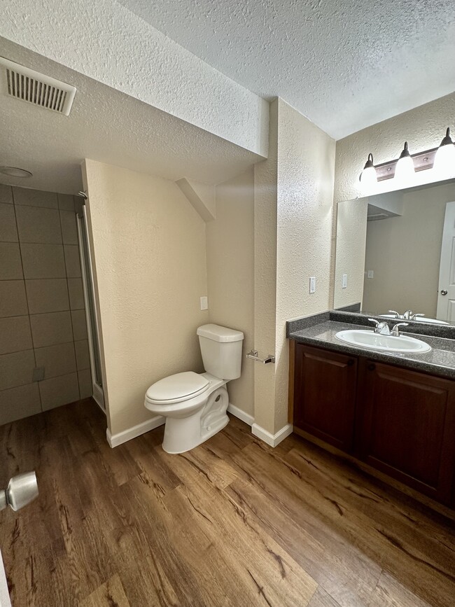 Experience luxury in a beautifully designed bathroom with contemporary finishes. - The Kimberly Apartments