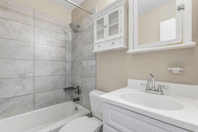 Building Photo - Large Renovated Ranch Home, Two Kitchens & Two Living Areas, Hardwood Flooring, Deck, Fenced!