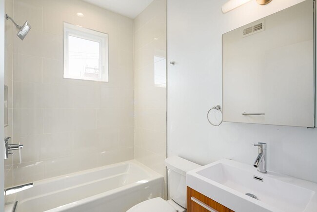 Building Photo - Stunning 4-Bedroom Townhouse with Garage and Rooftop Deck! Available late May!