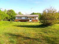 Building Photo - 5216 NW McIntosh Rd