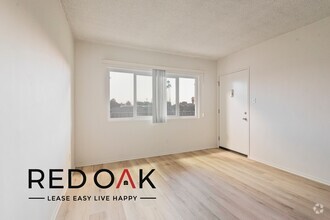 Building Photo - Cheerful Top Floor One Bedroom with Lots o...