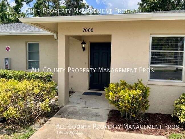 Building Photo - 7060 W Country Club Dr N