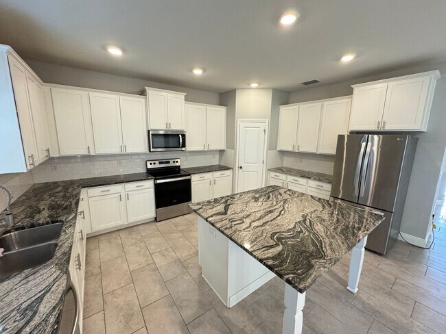 Building Photo - Available NOW!  Incredible, SPACIOUS 5 Bed...