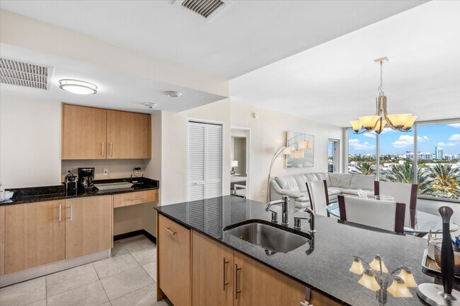 Building Photo - 10275 Collins Ave