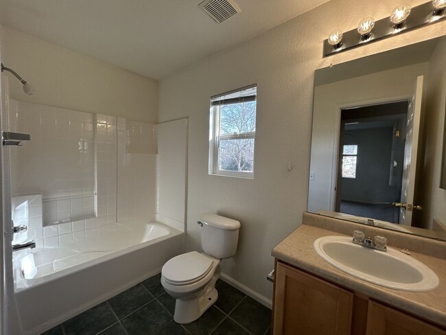 Building Photo - Spacious Fort Collins 4-Bedroom Home with Fenced Yard and Garage