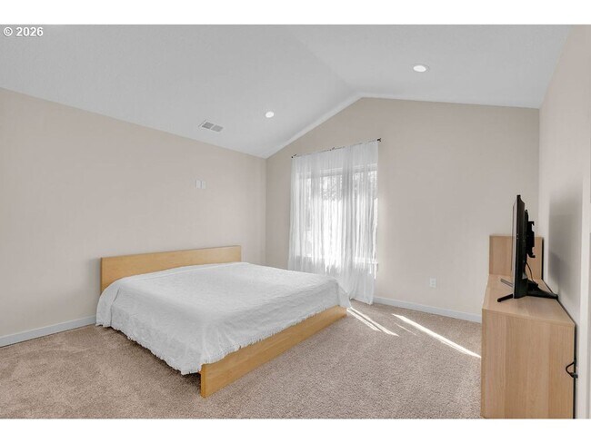 Building Photo - Bright Open-Concept Home with Vaulted Ceilings, Private Primary Suite & Stylish Modern Finishes