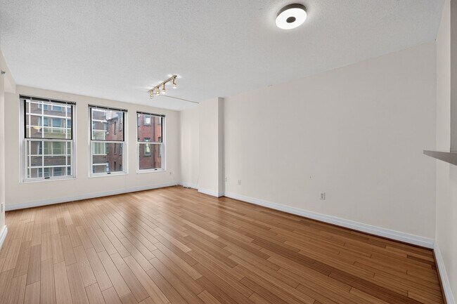Building Photo - Penn Quarter 1BR Condo with Balcony, Garage Parking, Storage, Concierge, and Rooftop Deck.