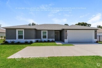 Building Photo - 1042 SW Del Rio Blvd