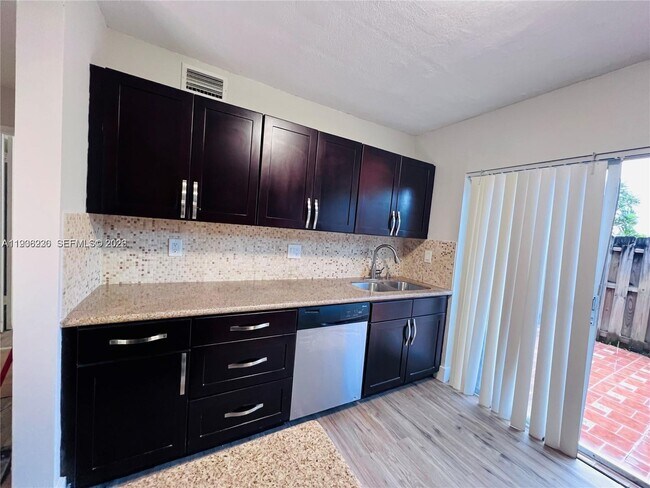 Building Photo - 7060 NW 173rd Dr