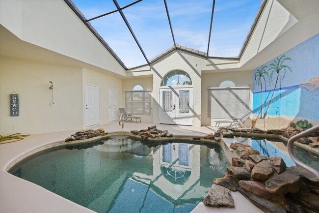 Building Photo - "Waterfront home with Courtyard Pool"