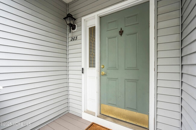 Building Photo - 203 Muskflower Ct
