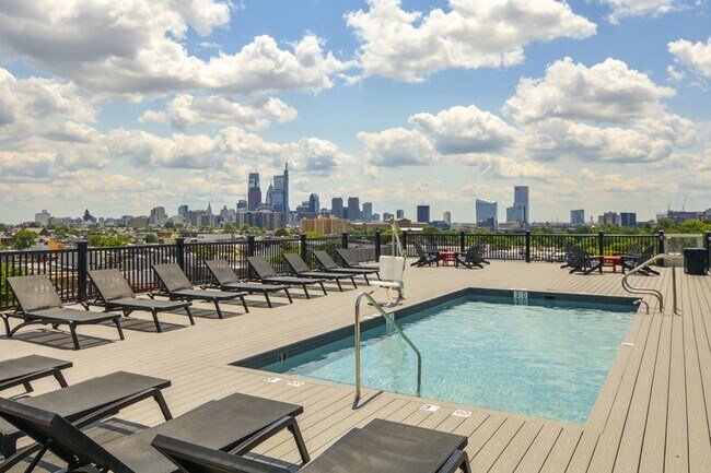 Rooftop Pool with City Views - The Storehouse Lofts