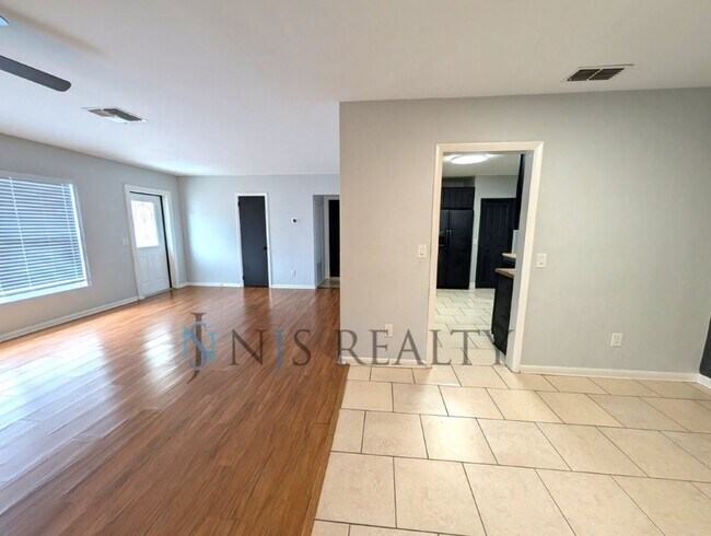 Building Photo - Beautiful 4/2/2 home with a POOL, 1700 Sq. Ft. with fenced yard, TONS of renovations