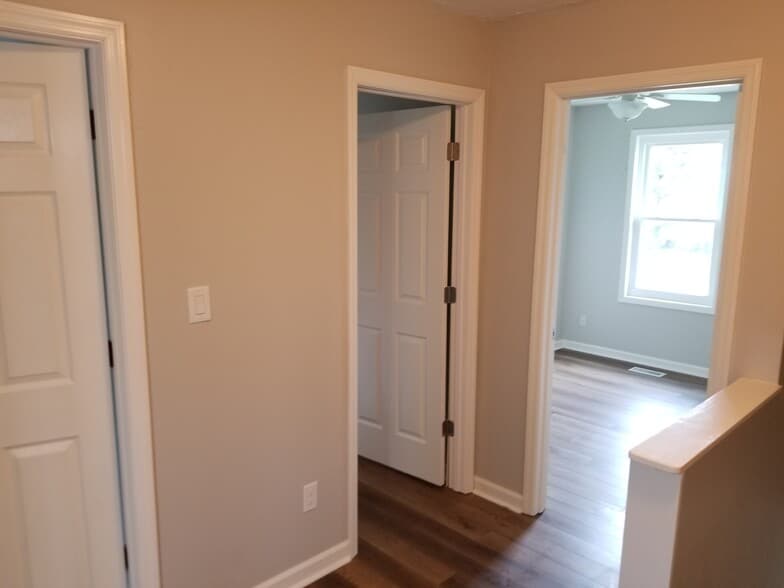 Upstairs looking at bedrooms #2 and #3 - 1445 Toshiba Drive, #B