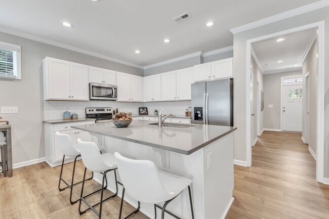 Building Photo - 3/3.5 Townhome Walking Distance to NC State