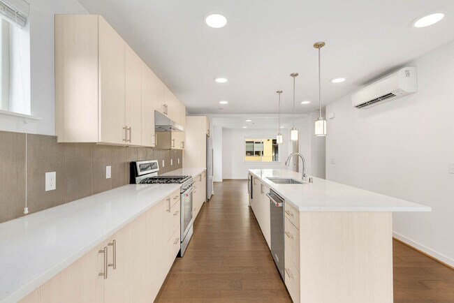 Building Photo - Modern Townhome in Upton at Crossroads Village – Stylish Living in a Prime Location