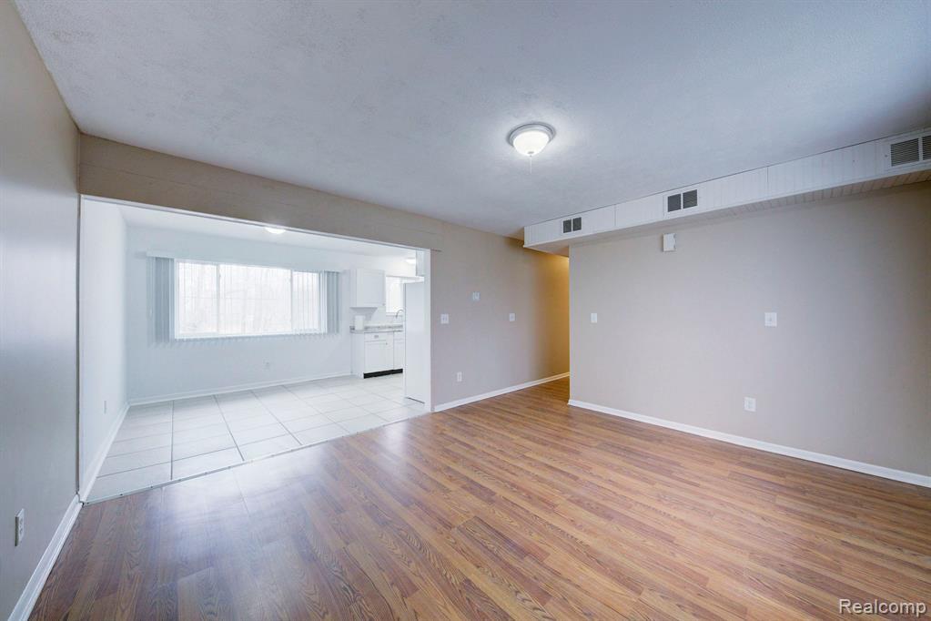 Upper unit Living and dining rooms - 217 Glenmoor St