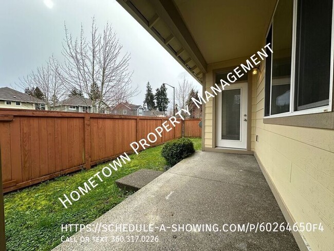 Building Photo - 4 bedroom 2.5 bath home Minutes to JBLM - ...