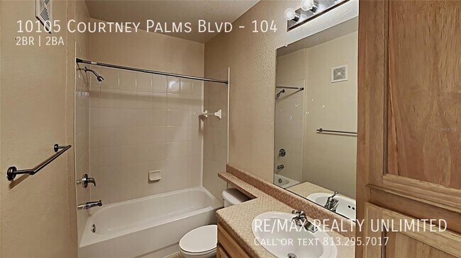 Building Photo - 10105 Courtney Palms Blvd