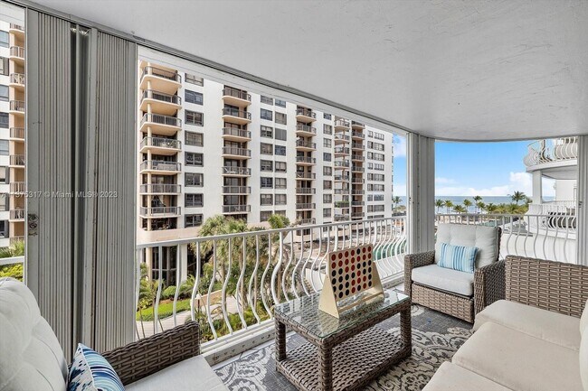 Building Photo - 10155 Collins Ave