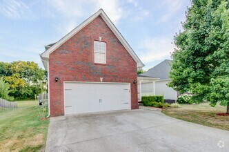 Building Photo - Stunning Brick Front Home With Fireplace A...