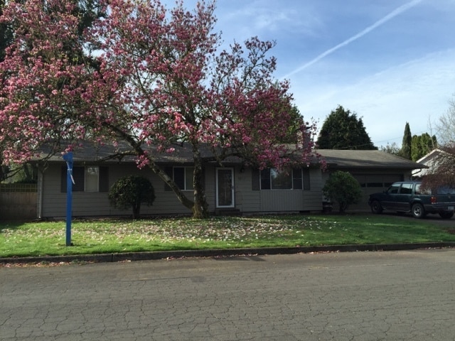 Building Photo - Well-Located Home with Fireplace, Fenced Yard & 2-Car Garage