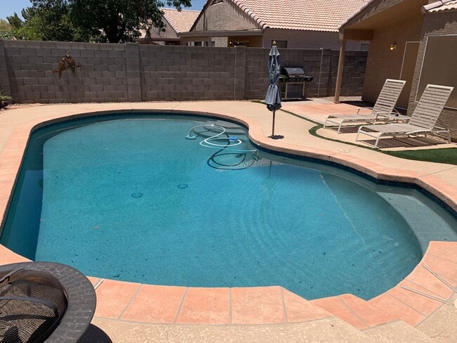 Building Photo - Spacious 3-Bedroom Home with Pool in Beaut...