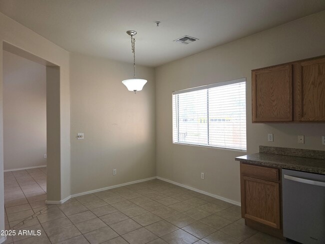 Building Photo - 8940 W Olive Ave