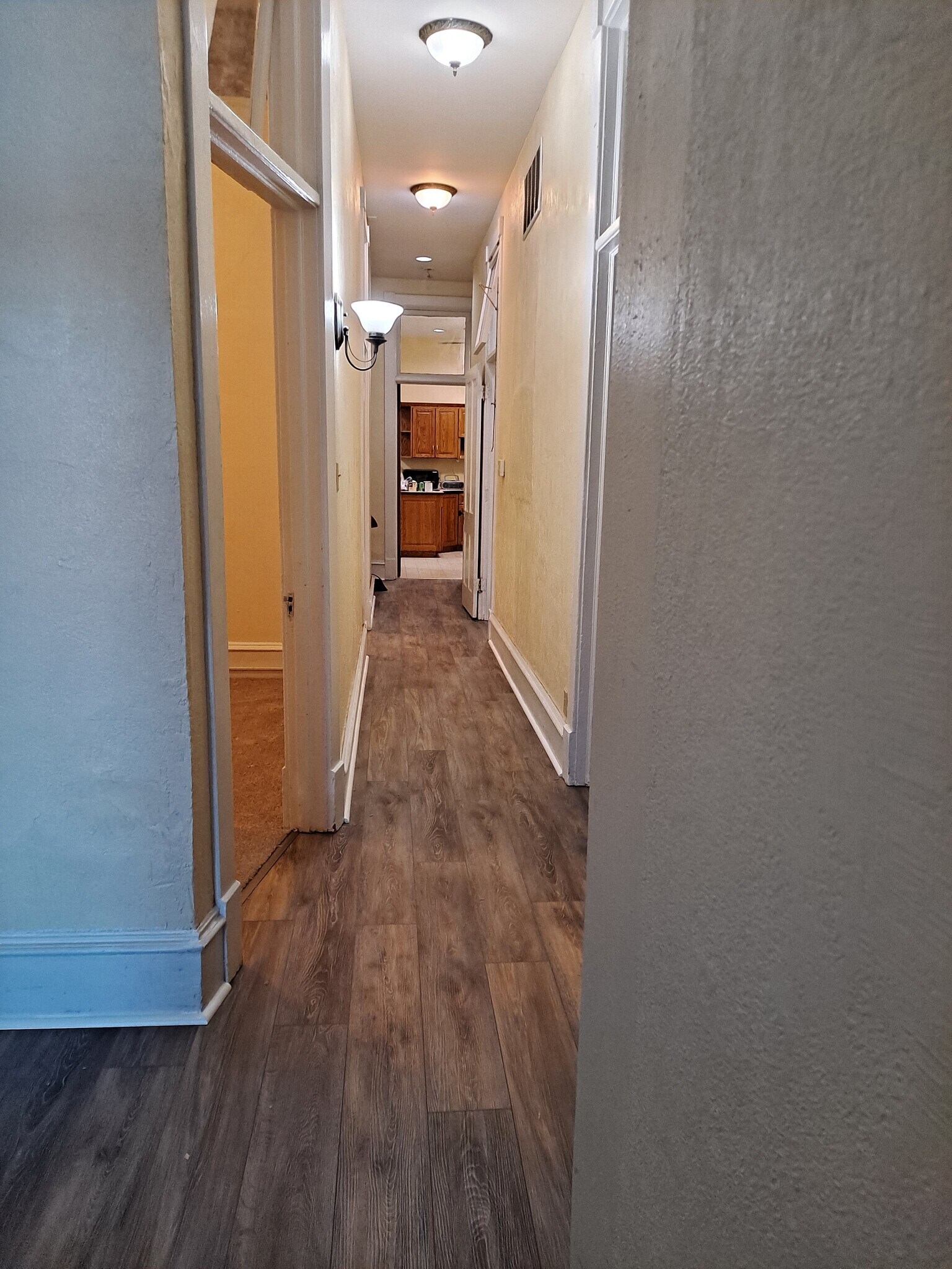 Hall towards kitchen and side room - 129 Main St