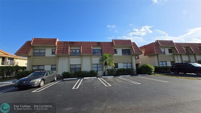 Building Photo - 11082 Royal Palm Blvd