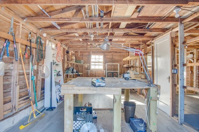 Building Photo - Coming Available 2/6 – 3-Bedroom, 1-Bathroom Cottage in East Hill with Solar Power & Wraparound D...