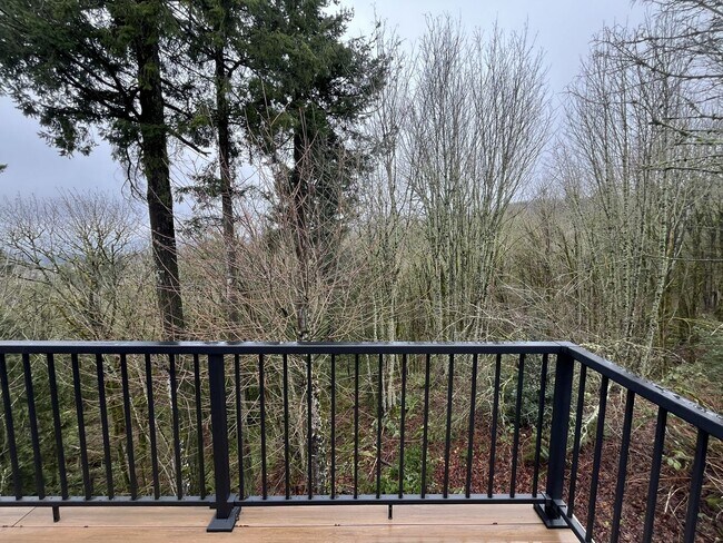 Building Photo - Executive-Style Northwest Heights Home with Forest Views and Refined Architectural Details