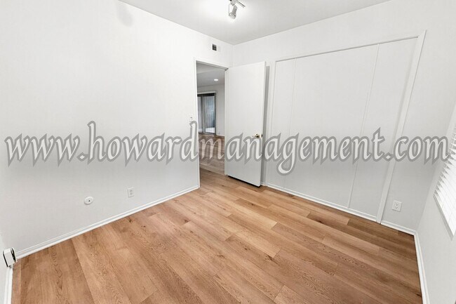 Building Photo - LAKE VIEW in LA! Majestic townhouse with high ceilings, three patios and lake view!