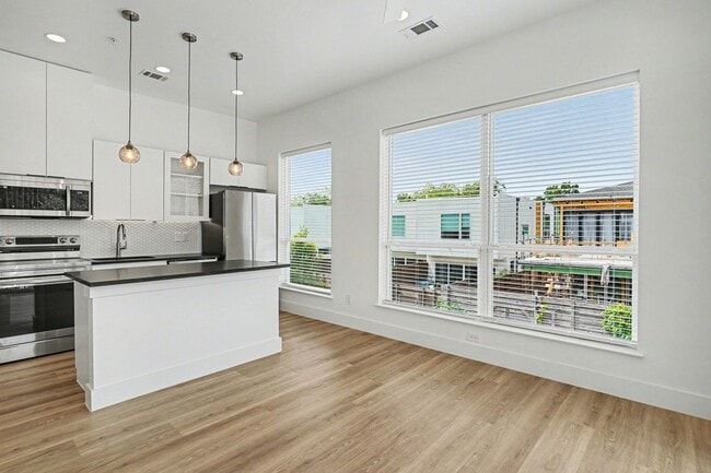 Building Photo - Be the first to live in Unit 207 at 2217 Fitzhugh—a brand-new 2026 construction offering 601 sq f...