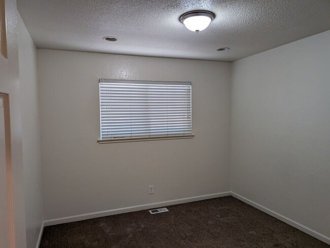 Building Photo - Updated home featuring a nice floor plan a...