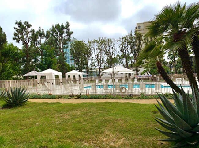 View of Pool from Private patio for this condo - 100 S Doheny Dr