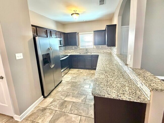 Building Photo - Gated Community, 4-Bedroom 2.5 Bath Home Available Now In Southeast Memphis @ Stonebrier