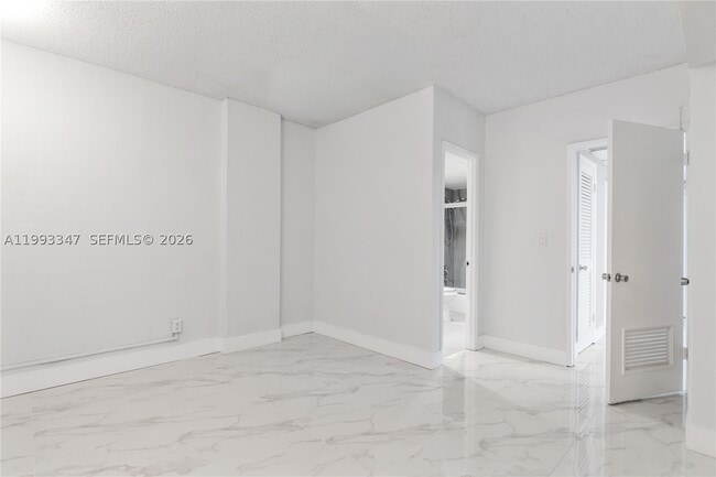 Building Photo - 19380 Collins Ave