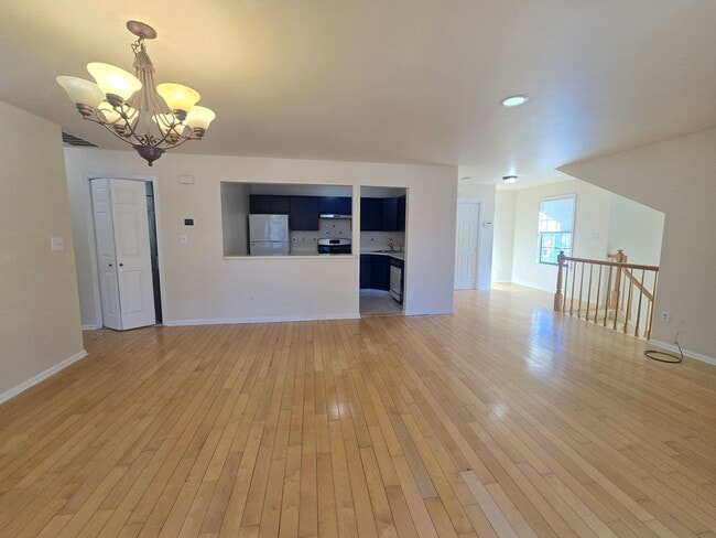 Building Photo - Commuter's delight! Spacious 2nd fl: 2-bed, 2-bath condo with fireplace, washer & dryer & off-str...