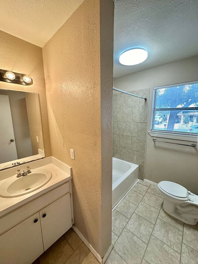 Building Photo - COMING MAY 2026 - Spacious & Centrally Located 3-Bedroom 2-Bathroom Home!