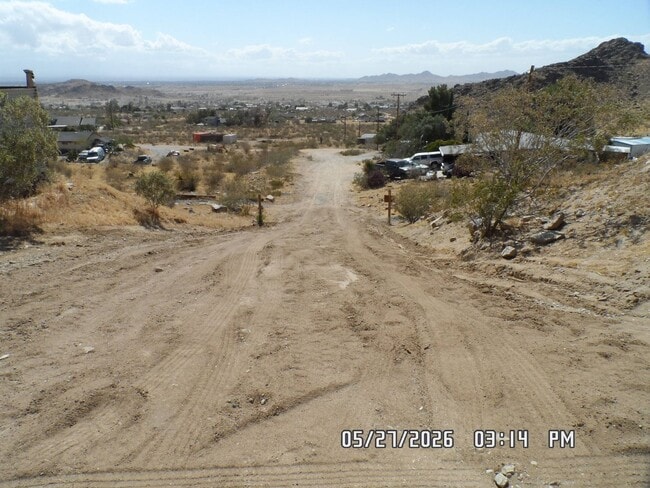 Building Photo - 2 Bedrooms, 1.5 Bathrooms, 2 Car Garage, 973 sq. ft., View of Victor Valley, Storage Shed