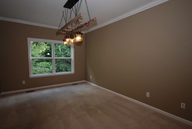 Building Photo - Oversized Executive Style Home with Finish...
